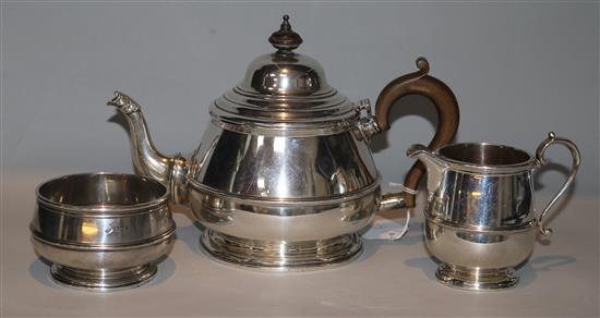 A 1920s silver three piece tea set by Goldsmiths 7 Silversmiths Co Ltd, London, 1921, gross 25.5 oz.
